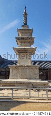 It's a picture of a stone pagoda that's common in Asia. It's called a cultural asset that flows through tradition and history