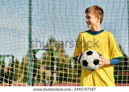 A young boy stands confidently in front of a goal, soccer ball in hand, envisioning his victory. His gaze is fixed on the net, determination in his eyes.