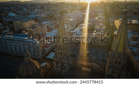 Aerial Drone Fly Above Guadalajara Mexico Church landmark Travel City historic center, Roman Catholic Building Architecture in Sunset around local traditional houses