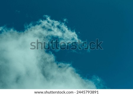 Turquoise blue sky, white clouds. Minimalist picture. Andes Mountains, Cerro las Nubes, Mount of the Clouds, in Jerico, Jericó, Antioquia, Colombia.