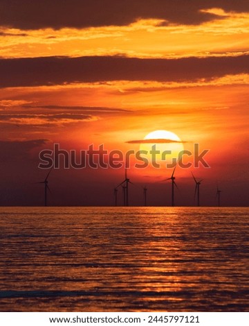 Sunset photo taken from the Scheveningen beach,Netherlands. Royalty-Free Stock Photo #2445797121
