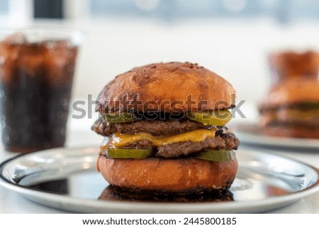 hamburger menu, grilled hamburger with cheddar cheese, delicious burger, delicious double burger smash on white background. burgers, single and stack with cheese. homemade burgers, single and stack.