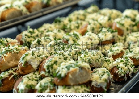 coffee break hotel during conference meeting, corporate revent with tea and coffee catering, decorated catering banquet table with variety of different pastry and bakery, with croissants and cookies Royalty-Free Stock Photo #2445800191