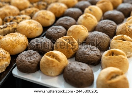 coffee break hotel during conference meeting, corporate revent with tea and coffee catering, decorated catering banquet table with variety of different pastry and bakery, with croissants and cookies Royalty-Free Stock Photo #2445800201