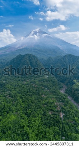 aerial view of Mount Merapi is the most active volcano in Indonesia located in the central part of Java Island in Sleman Regency, Yogyakarta Royalty-Free Stock Photo #2445807311