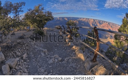 A rocky path to the Mohave Point Overlook, Grand Canyon, UNESCO World Heritage Site, Arizona, United States of America, North America Royalty-Free Stock Photo #2445816827