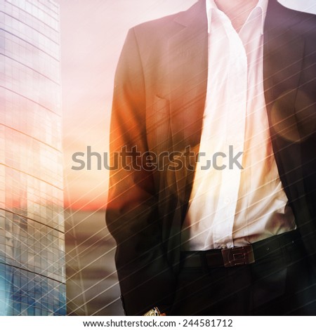 Businessman in front of city background
