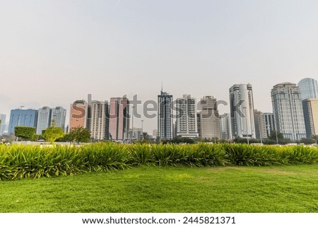 Abu Dhabi skyline from The Lake Park, United Arab Emirates.