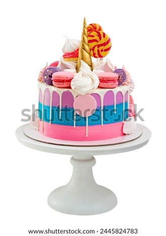 Bright beautiful pink cake with golden fondant horn, twisted lollipops, macaroons and meringues on neutral background, isolated, PNG