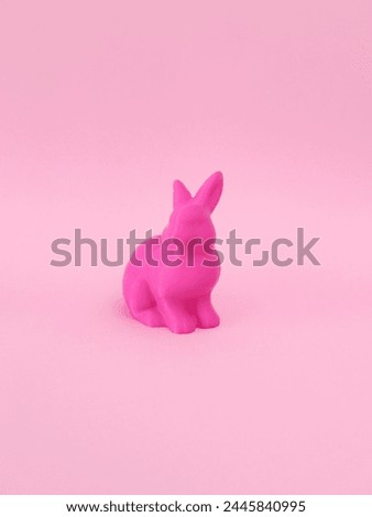 Pink easter bunny on pink background
