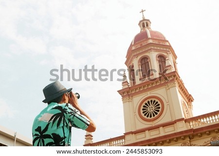 Visitor Shooting Picture of Santa Cruz Church Cathoric Church, a Well Known Historic Landmark of Thon Buri District in Bangkok, Thailand