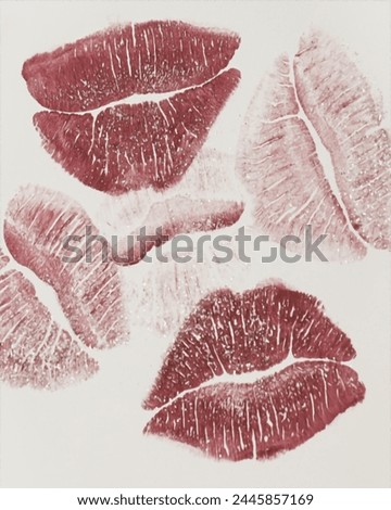Multiple imprints of lips with various shades of red lipstick, vintage style photo