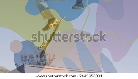 Image of colourful shapes over caucasian man skateboarding. global sport and digital interface concept digitally generated image.