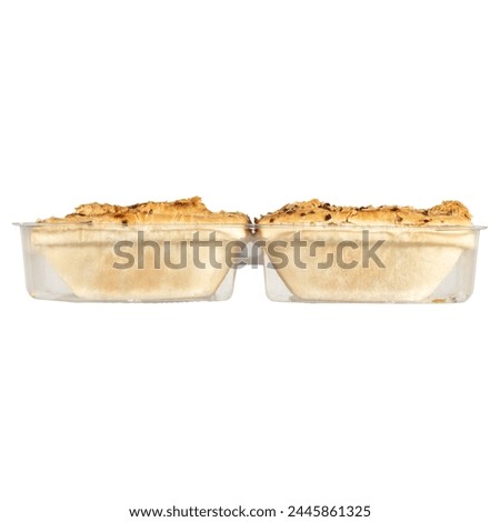 breads in a clear plastic box isolated on white background, close up, food photography, mock up. soft cookies with almond in plastic packaging.