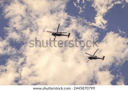 helicopter flying in the sky. two helicopter rotorcraft. police helicopter. heli copter flight. helicopter ride Royalty-Free Stock Photo #2445870799