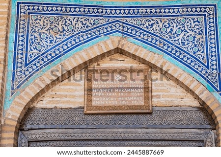 Khiva, Xorazm Region, Uzbekistan, Central Asia. Entrance to the Muhammad Amin Khan Madrasa in Khiva.