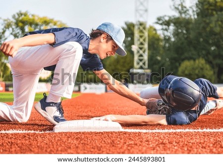 A Young teen boy play baseball on a playground