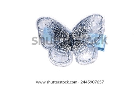 Butterfly hair bands made from spirals must be suitable for children and adults for hair clips
					 Royalty-Free Stock Photo #2445907657