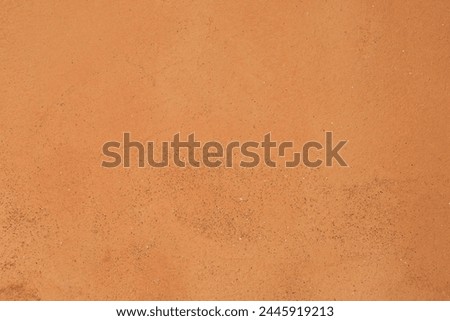 Background Texture of the Red Clay Wall in a Building Made of Soft and Fine Red Clay   