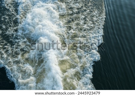 Wake of a fast ferry at speed. Royalty-Free Stock Photo #2445923479