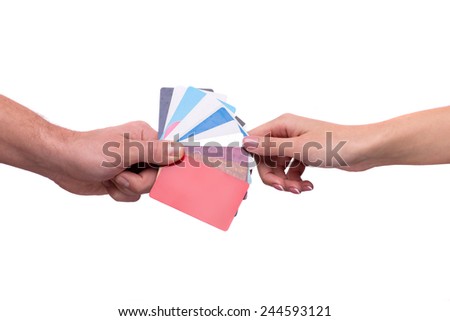 Staying always in touch. Closeup image of visiting cards passing from one hand to another isolated on white background