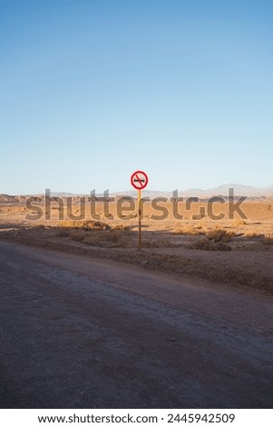 Traffic signal in deserted dirt road in rural San Pedro de Atacama, Chile.