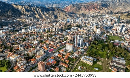 La Paz, Bolivia, aerial view flying over the dense, urban cityscape. San Miguel, southern distric. South America Royalty-Free Stock Photo #2445953933