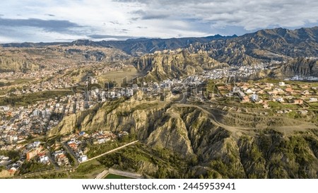 La Paz, Bolivia, aerial view flying over the dense, urban cityscape. San Miguel, southern distric. South America Royalty-Free Stock Photo #2445953941