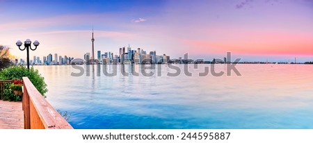 Panorama of Toronto City reflected on the lake.