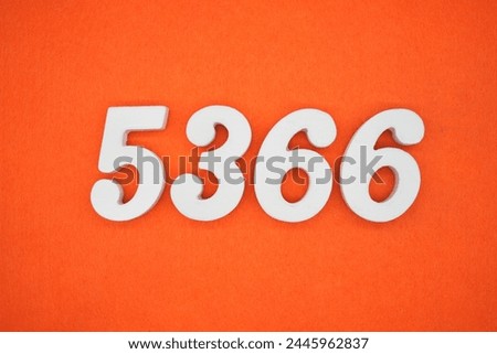 Orange felt is the background. The numbers 5366 are made from white painted wood.