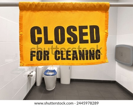 Temporary closed for cleaning sign in public toilet during during hygiene cleaning