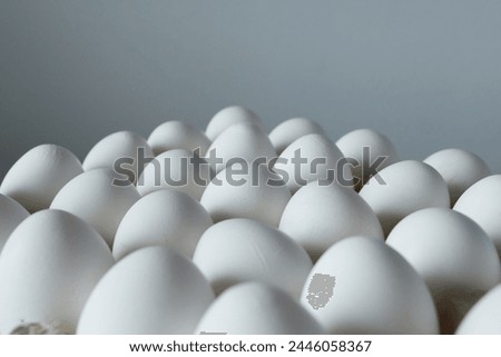 Eggs on a white background. Close-up. Selective focus.