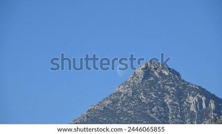 the moon, just before colliding with the mountain, Alicante province, Costa Blanca, Spain