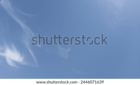 a beautiful clear blue sky and slightly cloud in there too Royalty-Free Stock Photo #2446071639