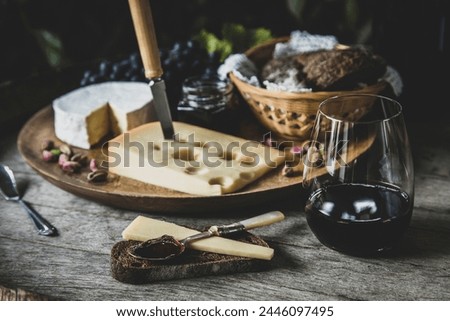 Wine and cheese platter on a wine barrel
