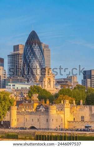Tower of London, UNESCO World Heritage Site, and the Gherkin (30 St. Mary Axe), City of London, London, England, United Kingdom, Europe Royalty-Free Stock Photo #2446097537