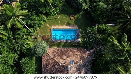 Aerial view of a villa with a swimming pool in the tropics. Hiriketiya beach