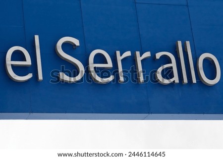 The image shows the text el serrallo, in white 3D letters on a vibrant blue background. El Serrallo is a well-known maritime district of the city of Tarragona, which makes.