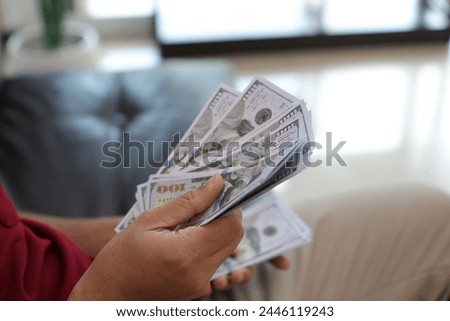 Money dollar bills in hand
