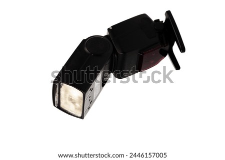 Flash for a camera. On a white background. space for a text label. on modern black flash. on a white background. To illuminate the subject, people.
