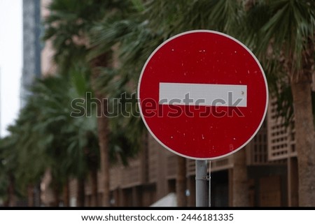 No Entry road sign . The road is closed red round sign. White brick in red circle road sign.