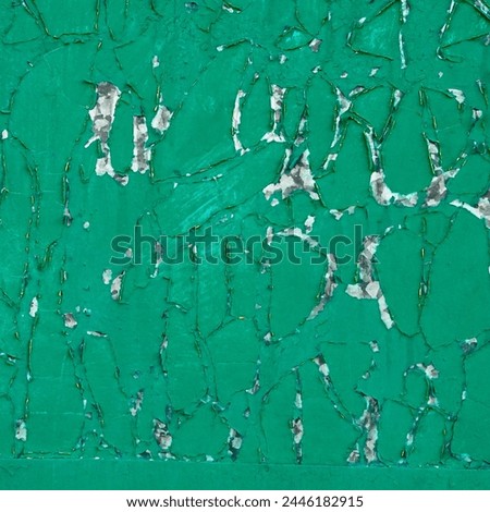 Peeling Green Paint On Textured Surface, Close-Up View Of Weathered Painted Texture