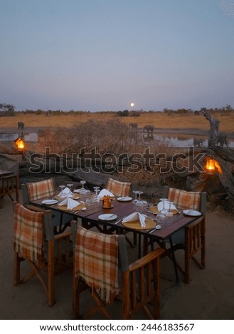 Dining al fresco on Safari in Botswana Royalty-Free Stock Photo #2446183567