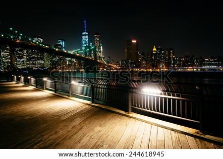 The Brooklyn Bridge and Manhattan Skyline at night seen from Brooklyn Bridge Park, New York.