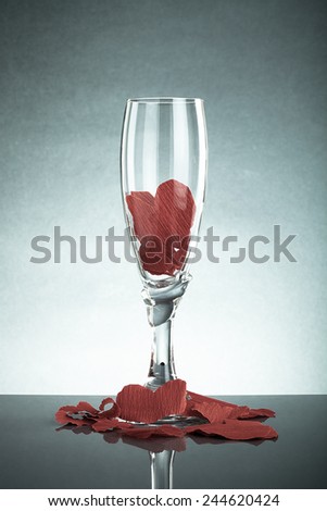 glass filled with valentines with reflection