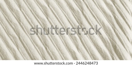 Abstract Sandy beach texture with imprint pattern.Banner. Copy space. neutral color.