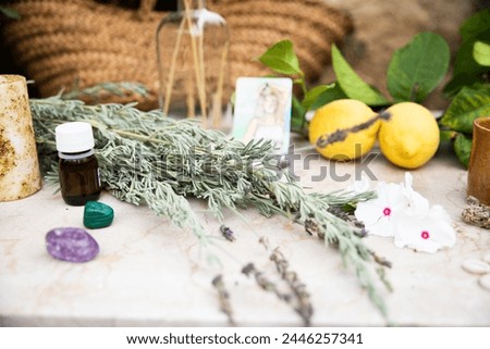 Detail of a bouquet of lavender, lemons and semiprecious stones. Royalty-Free Stock Photo #2446257341