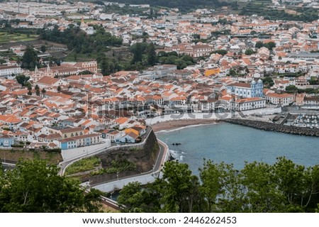 Aerial view of the Prainha bathing area, marina and architecture of downtown of Angra do Heroísmo, Terceira - Azores PORTUGAL Royalty-Free Stock Photo #2446262453