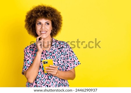 Photo of funky dreamy lady dressed leopard print shirt communicating modern device empty space isolated yellow color background