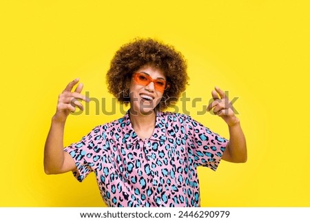 Photo of cool funky lady dressed leopard print shirt sunglass dancing having fun isolated yellow color background